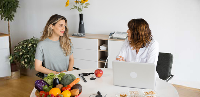 Patient receiving Nutritional Counseling in Cumming for pain relief